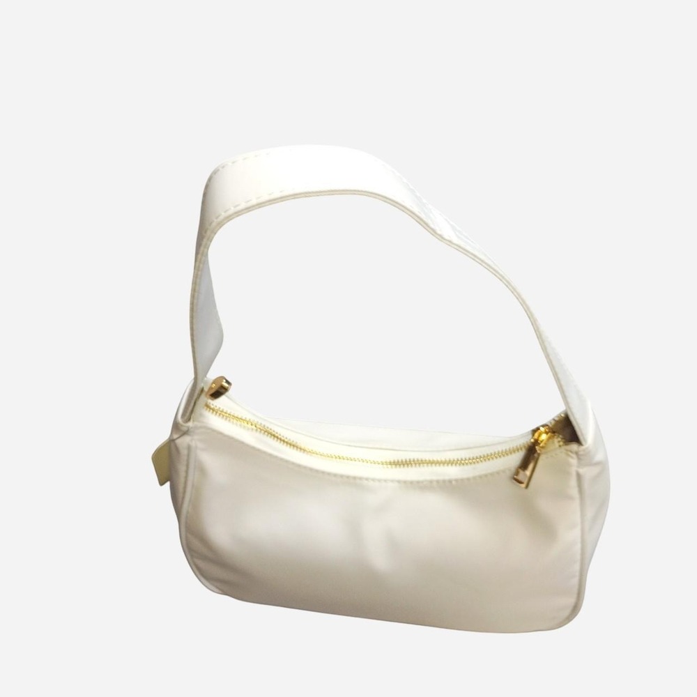 White faux leather shoulder bag with gold hardware. NWT